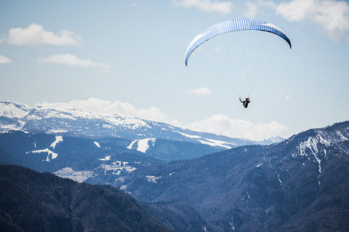 Skydiver helping customers take the leap logo